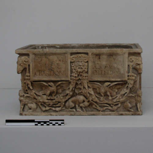 festoni  con protomi d'ariete agli angoli e testa di Zeus Ammon centrale (urna) - ambito romano (fine età romana/ sec. I d.C.)